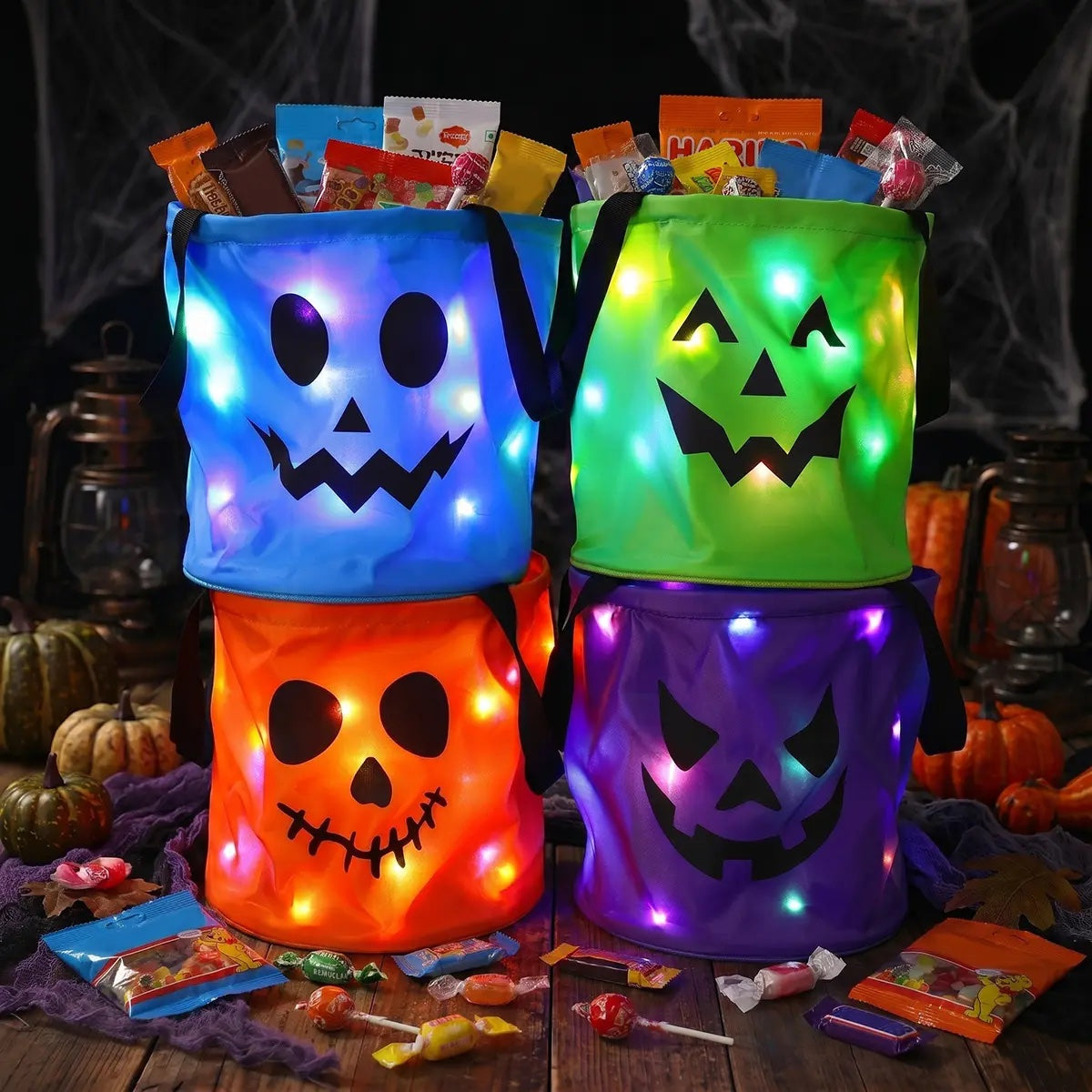 Blue, green, orange and purple light-up candy bags full of treats